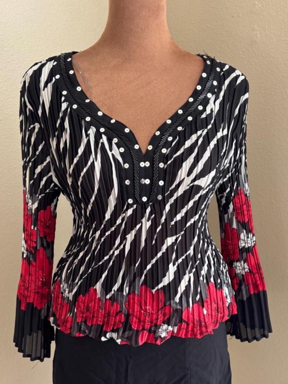 Y2K/whimsigoth/statement-top. Black and white zebra-inspired print